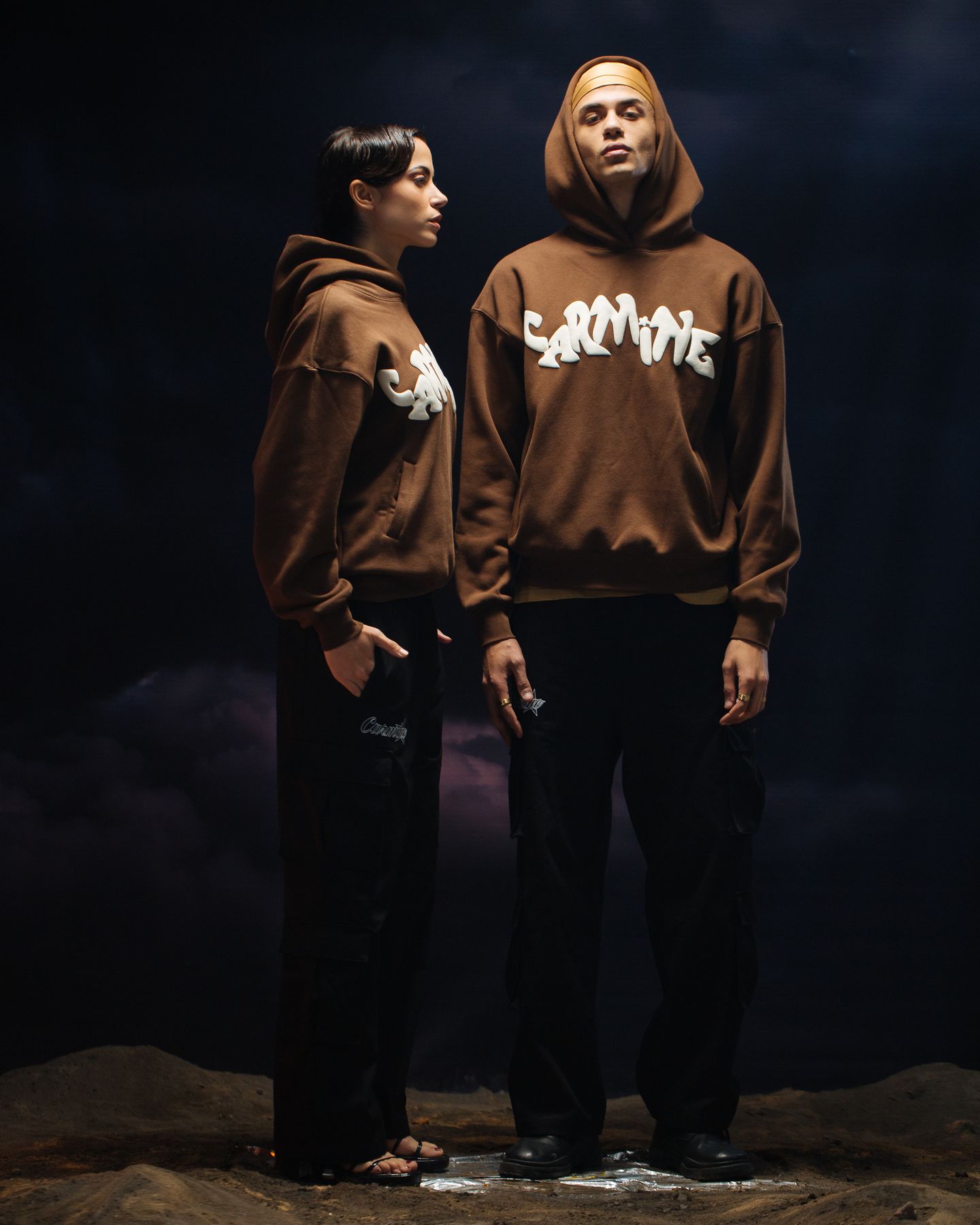 Two models in brown hoodies