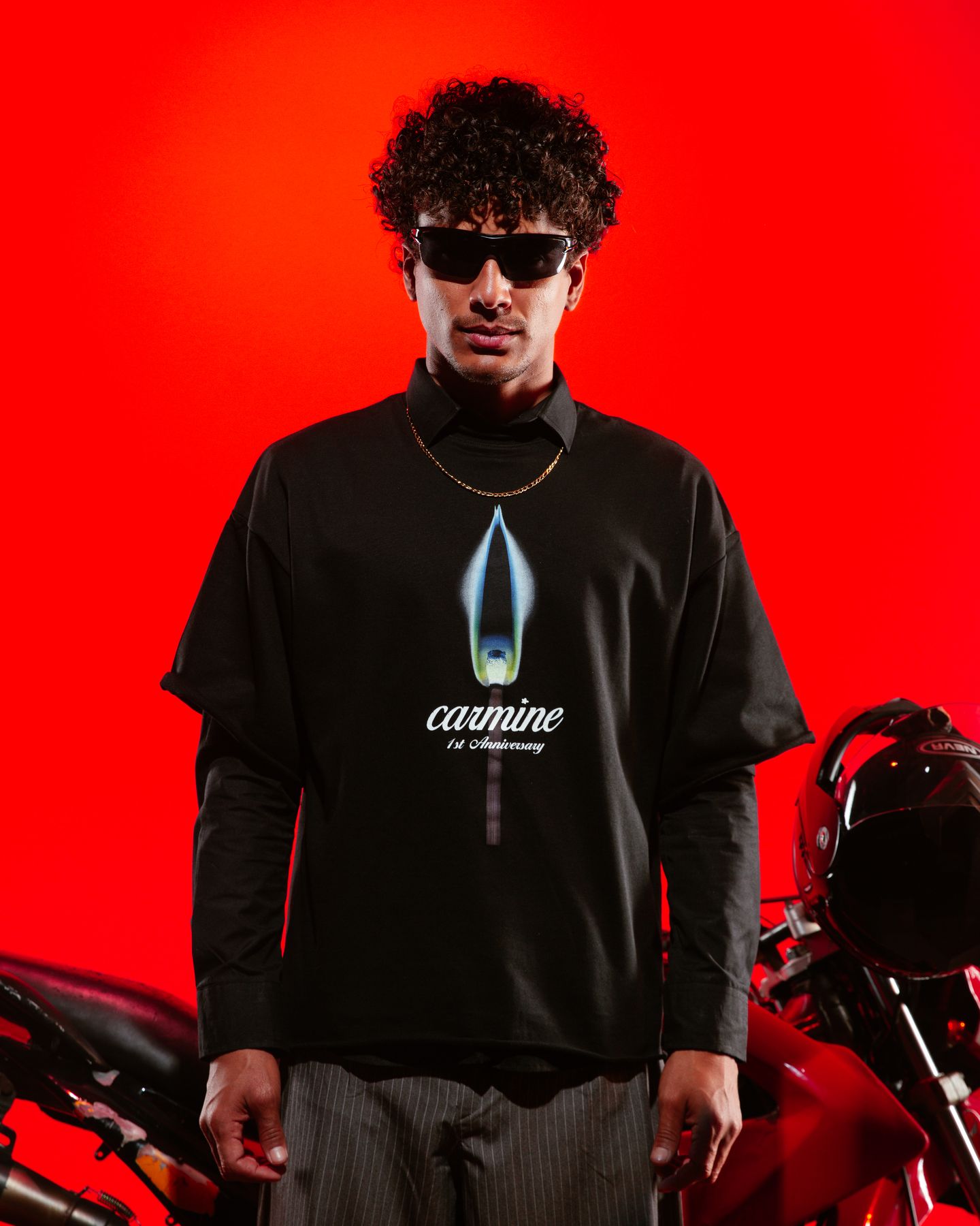 Carmine campaign, model with a red motorbike